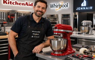 Stand Mixer Repair: 3 Critical Signs Your Mixer Needs Professional Service – Smooth Repair Services Stand Mixer Repair - Professional technician smiling beside a red KitchenAid stand mixer in a repair workshop specializing in KitchenAid, Whirlpool, and JennAir mixers.